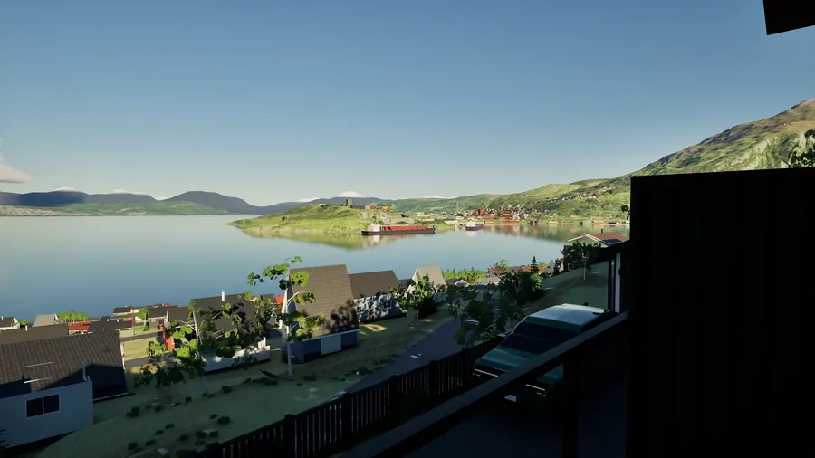 Utsikt fra balkongen over hus til fjorden og havna.