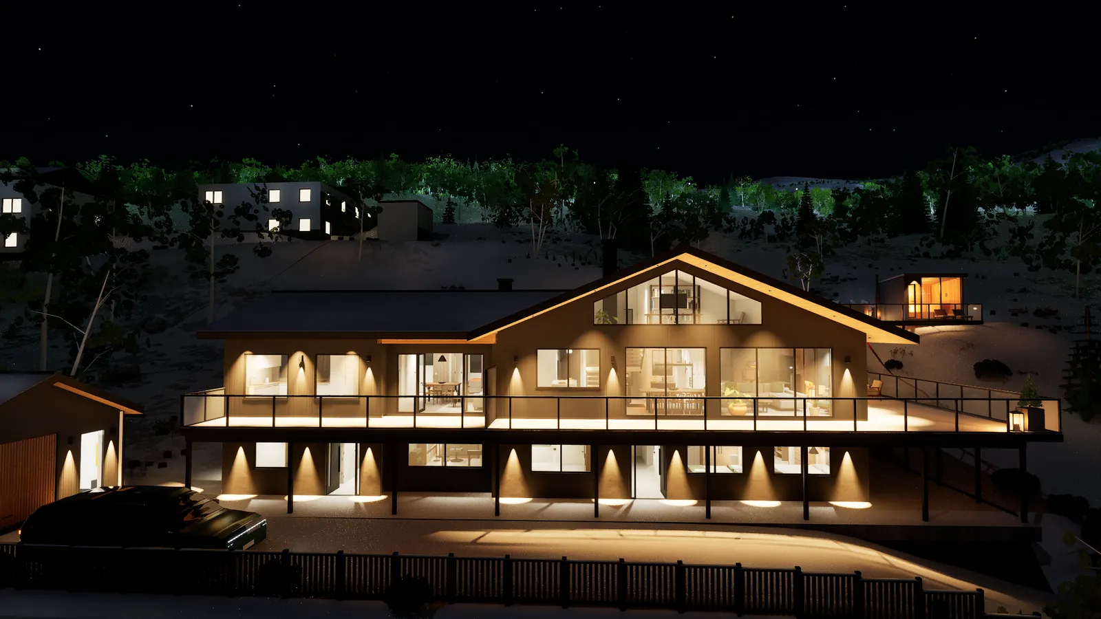 Huset om natten 7. november med varmt lys i alle vinduer og snø på bakken.